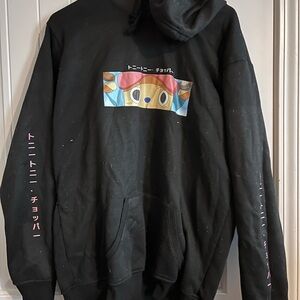 Black Hoodie with Cartoon Graphic